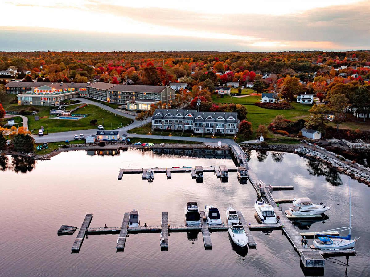 Exterior of Oak Island Resort & Conference Centre overlooking Mahone Bay at sunset